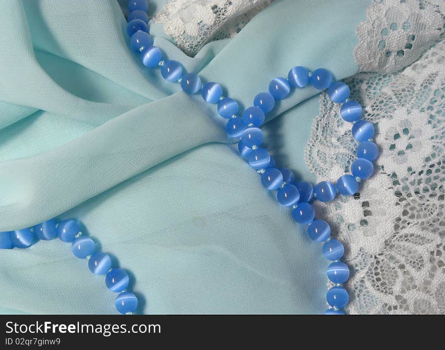 Smooth elegant and very nice and beautiful silk fabric with pearls ,background. Smooth elegant and very nice and beautiful silk fabric with pearls ,background