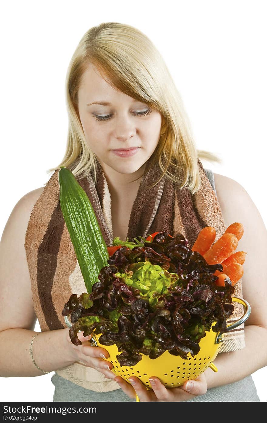 Young woman presenting fresh vegetables - isolated on white. Young woman presenting fresh vegetables - isolated on white