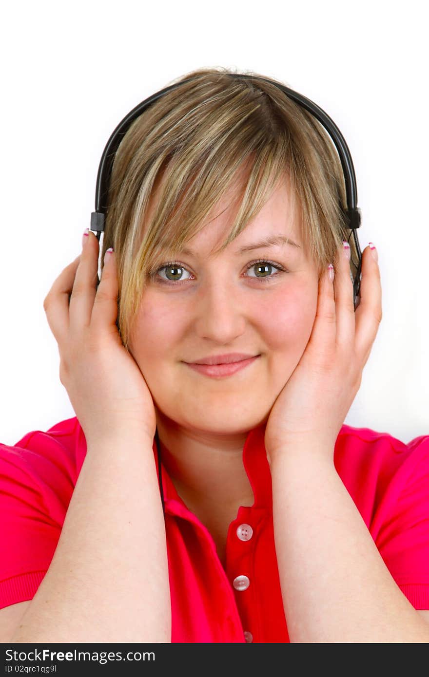 Young woman with headset on white background. Shot in studio. Young woman with headset on white background. Shot in studio.