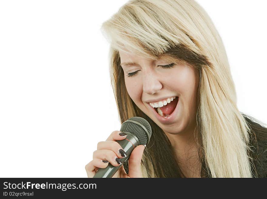 Young woman with microphone isolated on white background. Young woman with microphone isolated on white background