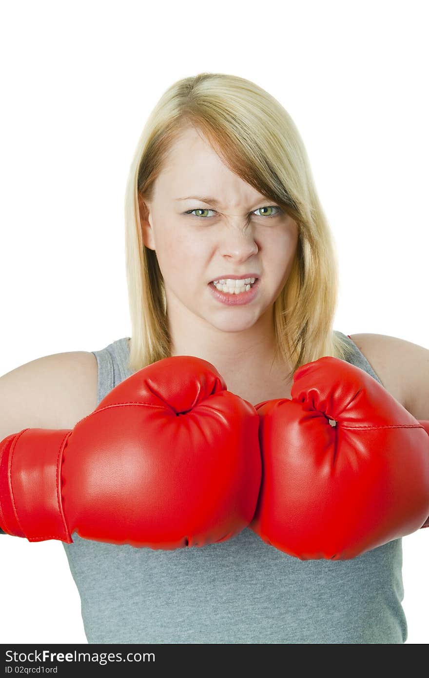 Young woman with red boxing gloves - isolated on white. Young woman with red boxing gloves - isolated on white