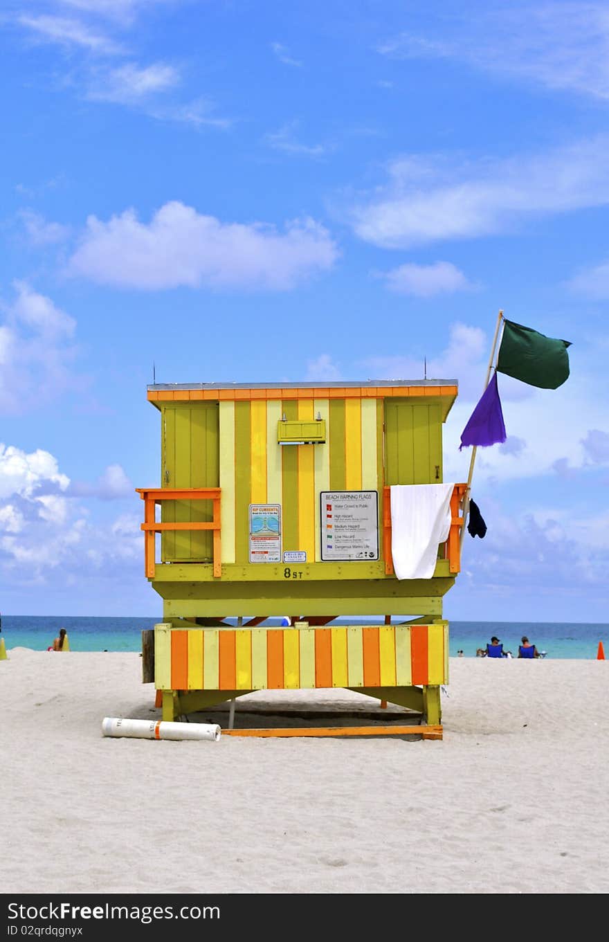 Green, Yellow and Orange South Beach Hut