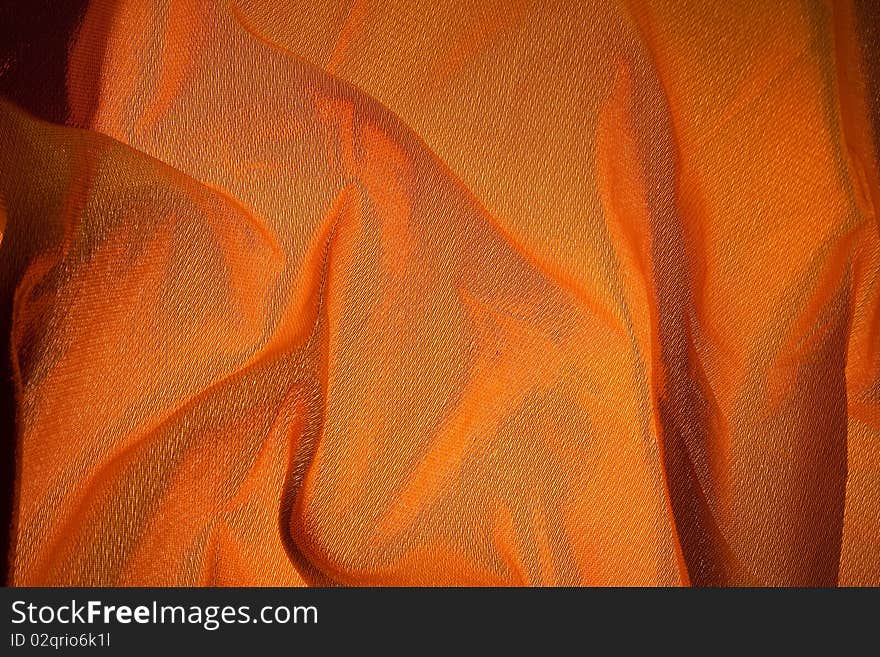 Lighting on golden cloth background