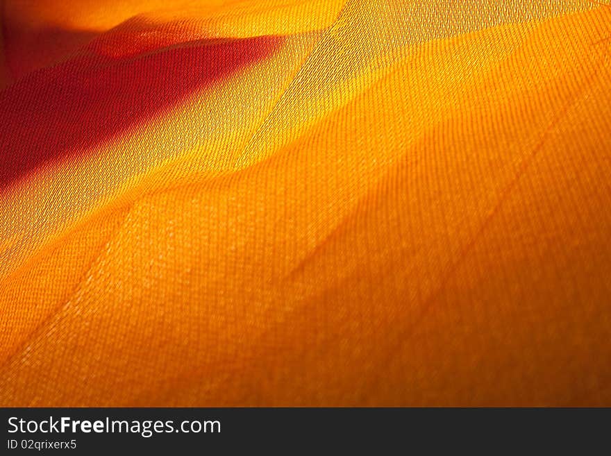 Lighting on golden cloth for background. Lighting on golden cloth for background