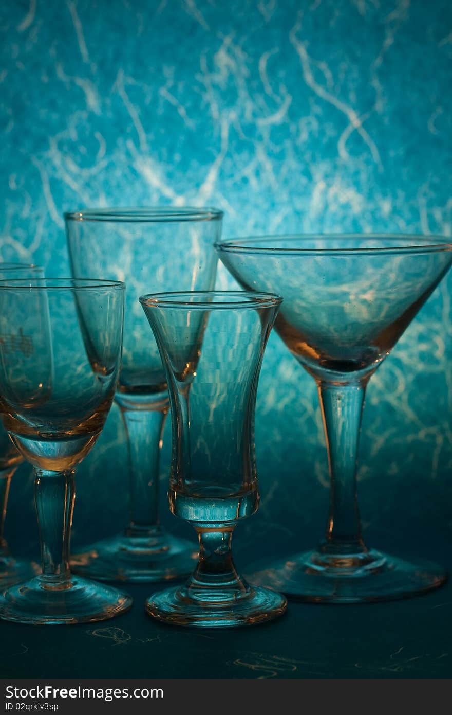 Many glass on blue background