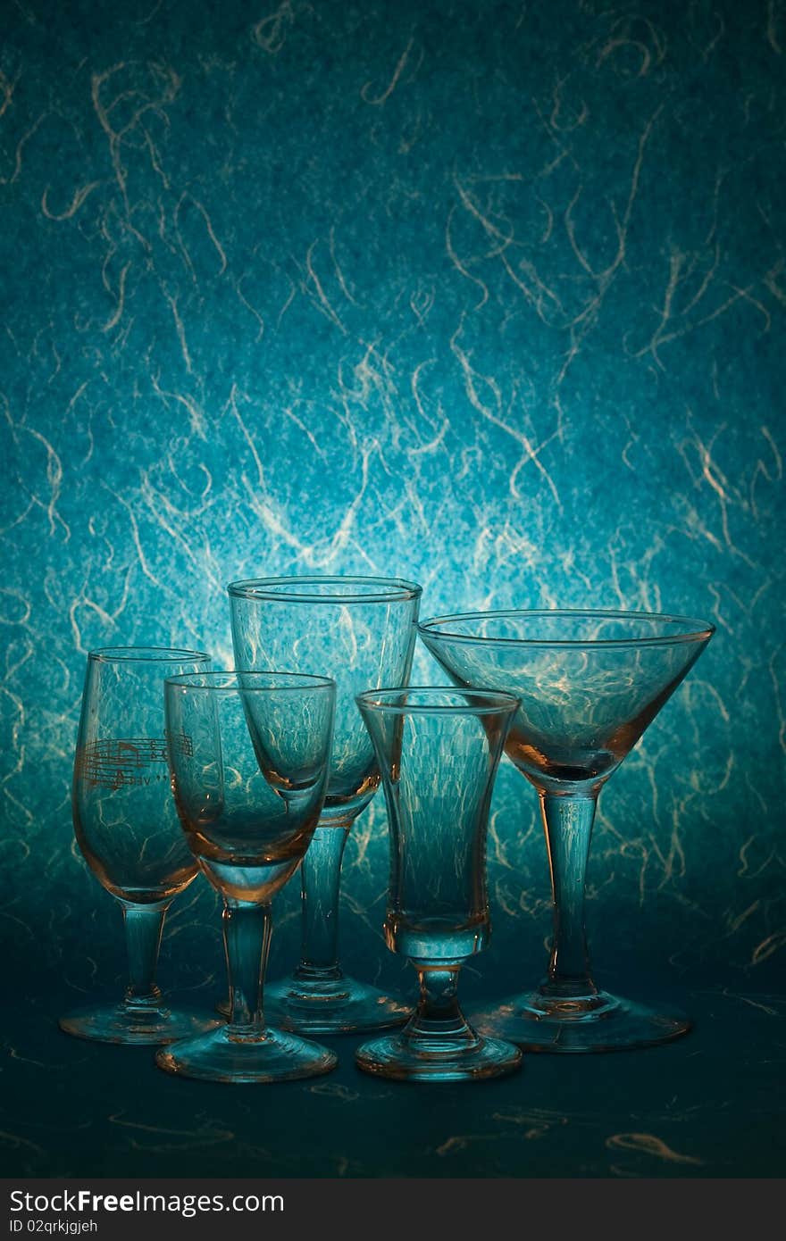 Many glass on blue background