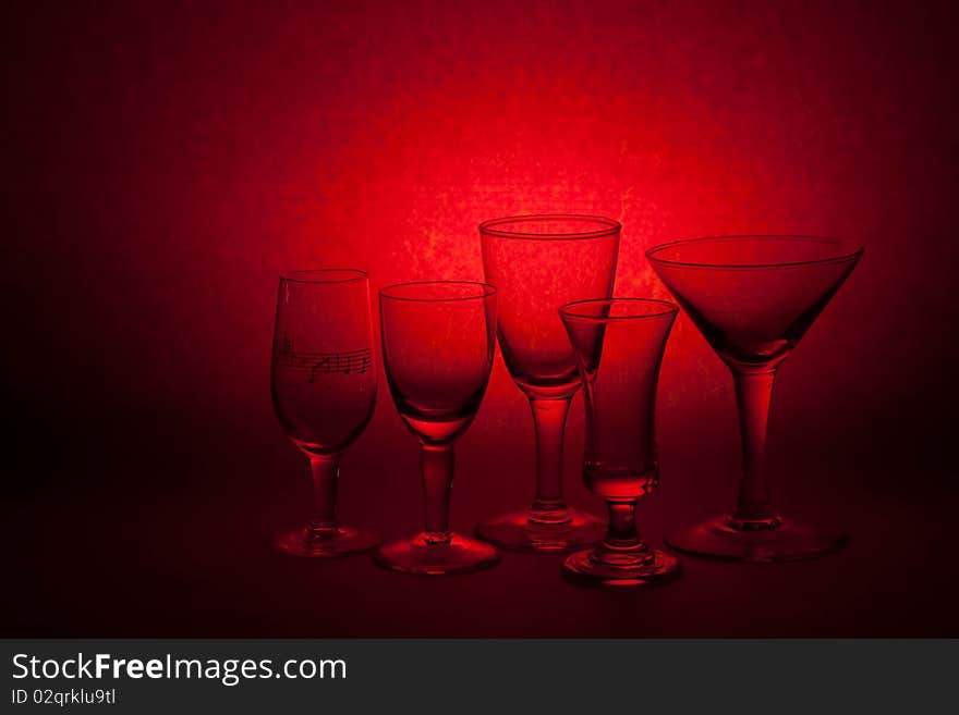 Many glass on red background