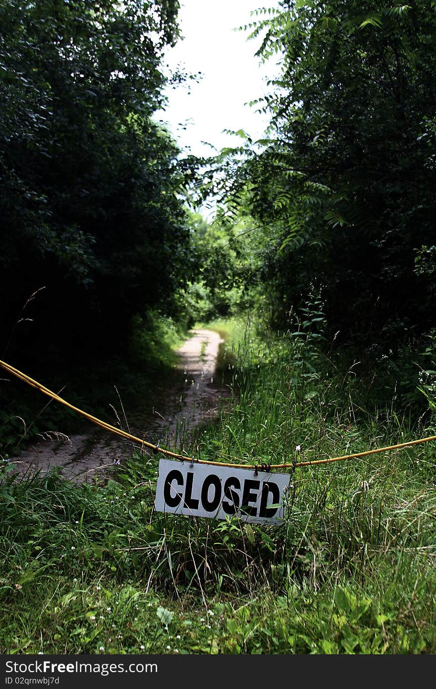 Forbidden trail into the woods. Forbidden trail into the woods