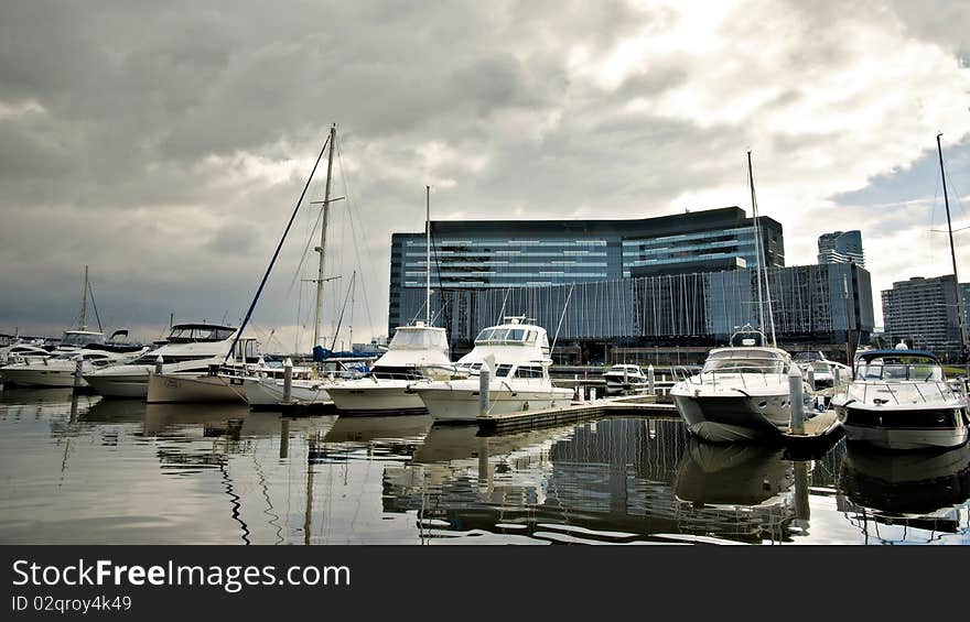 Marina port with building and yachts