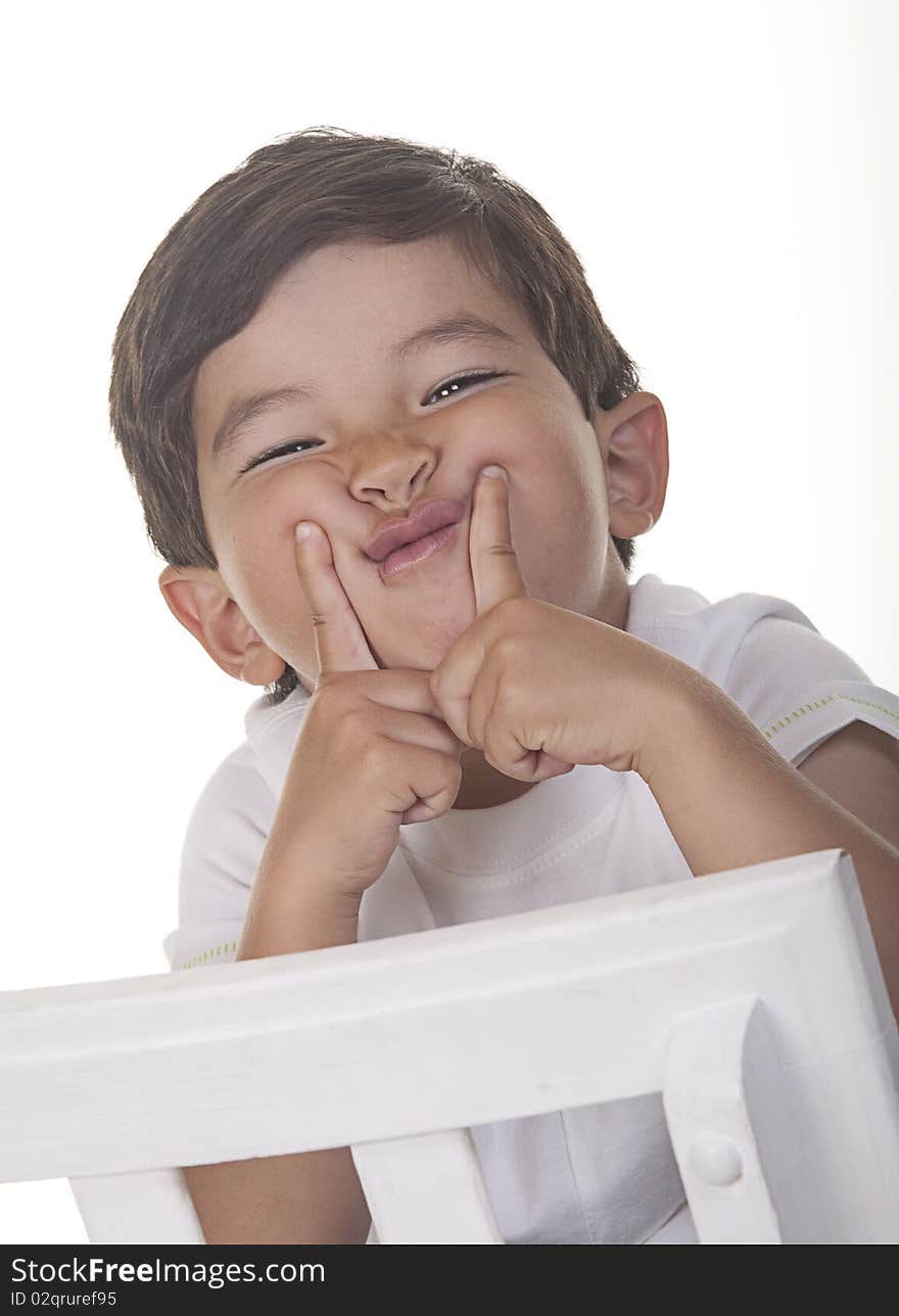 Little Boy Makes A Funny Face.