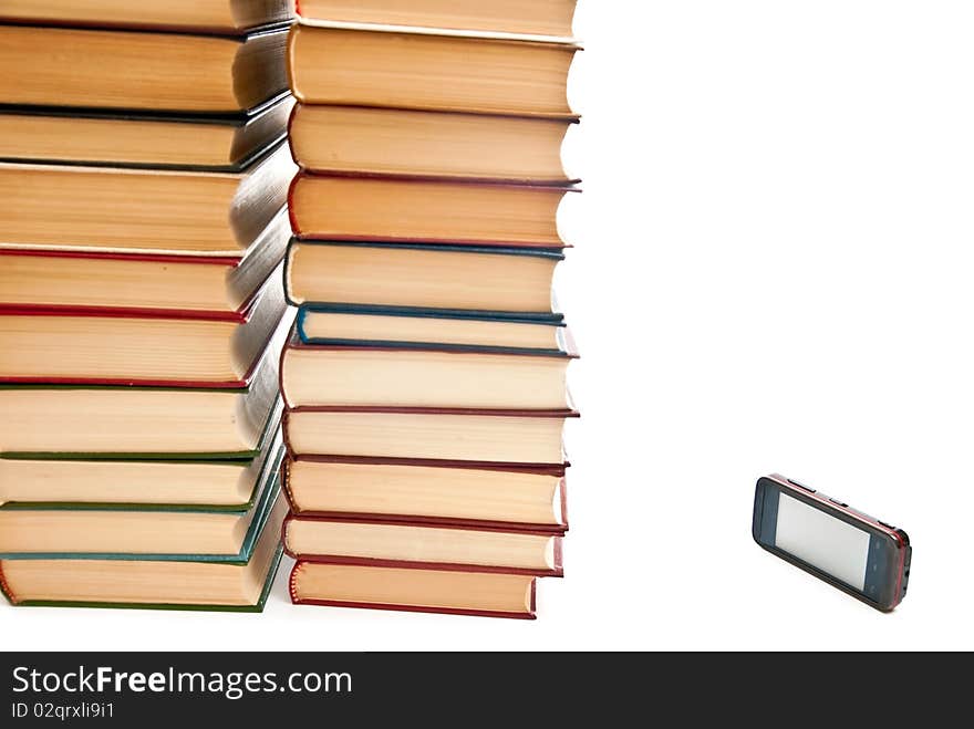 Row of books and mobile phone on white background