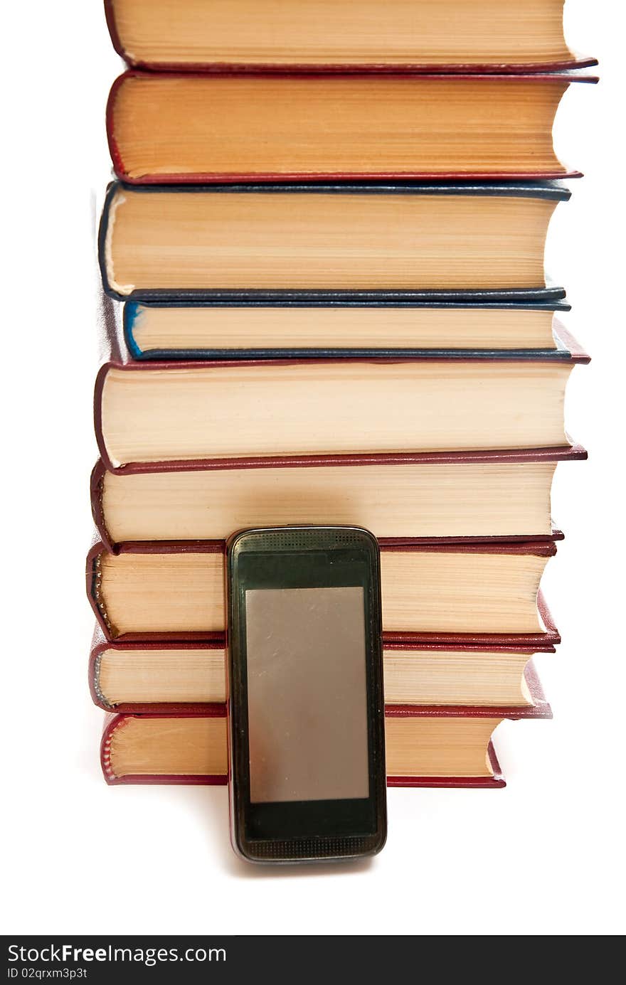 Row of books and mobile phone on white background