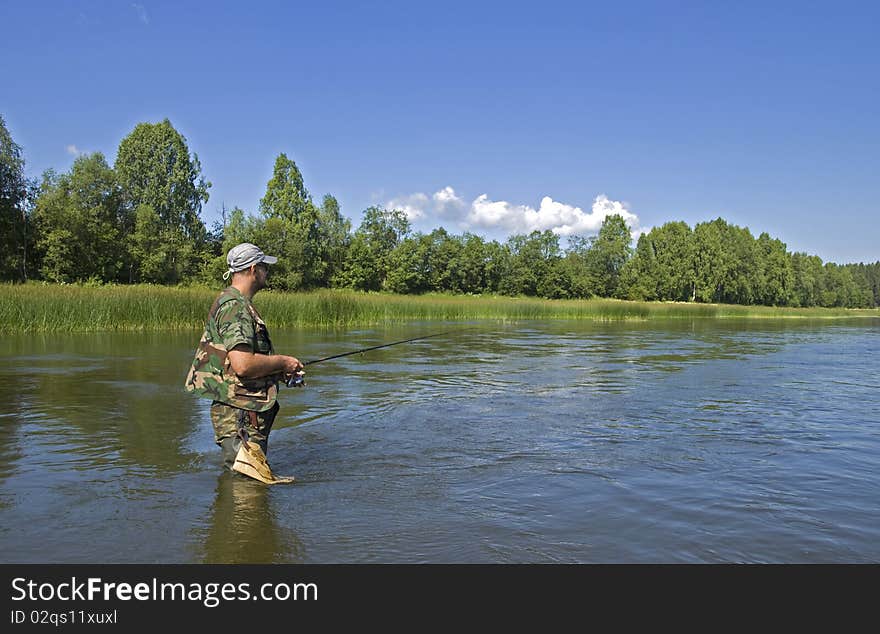 Photo of the fisherman on the river