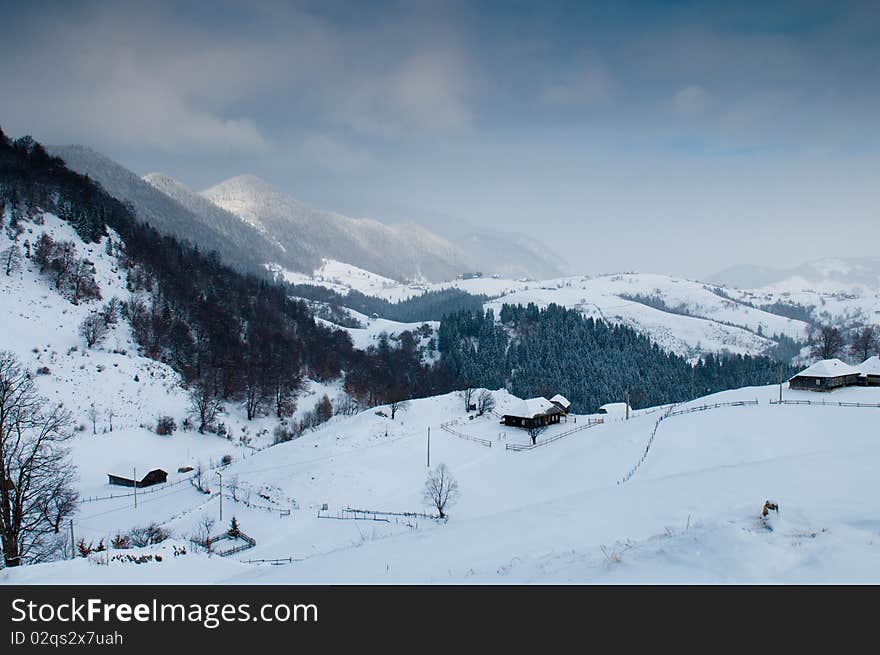 Isolated Houses in mountain, in winter landscape