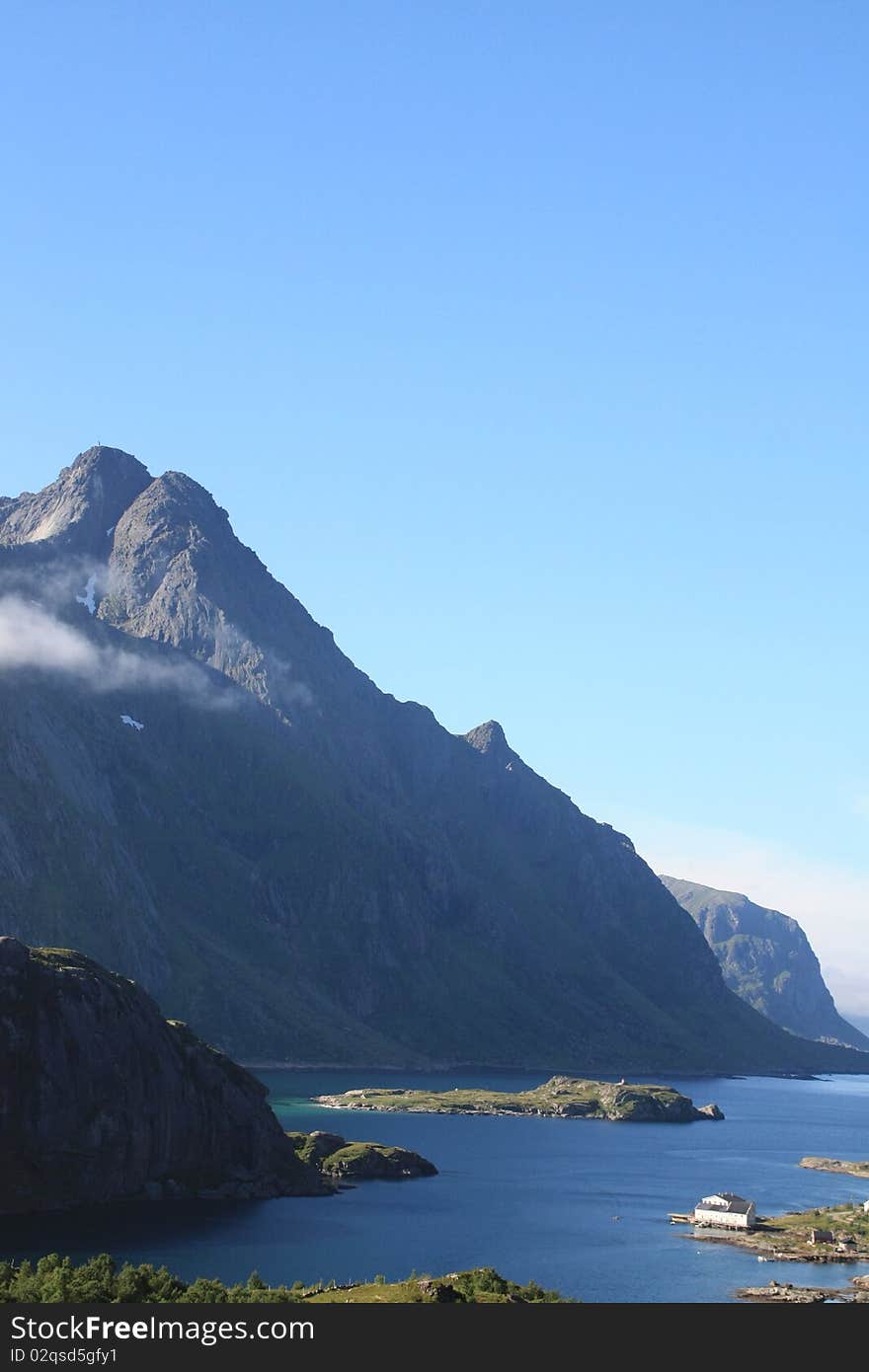 The Himmeltinden mount and the fjord of Tangstad