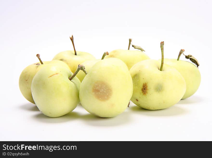 Green apples on white background