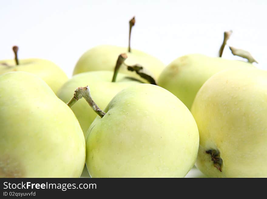 Green apples on white background