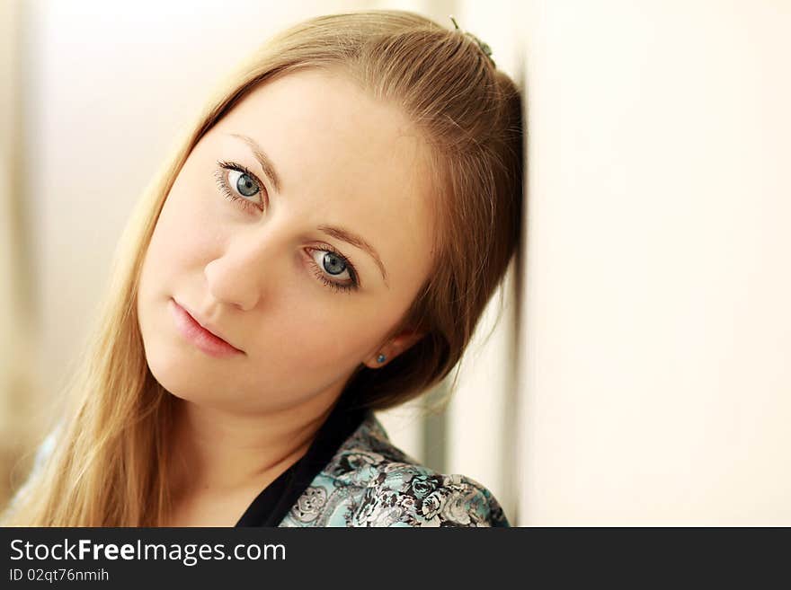 Portrait of beautiful woman in home