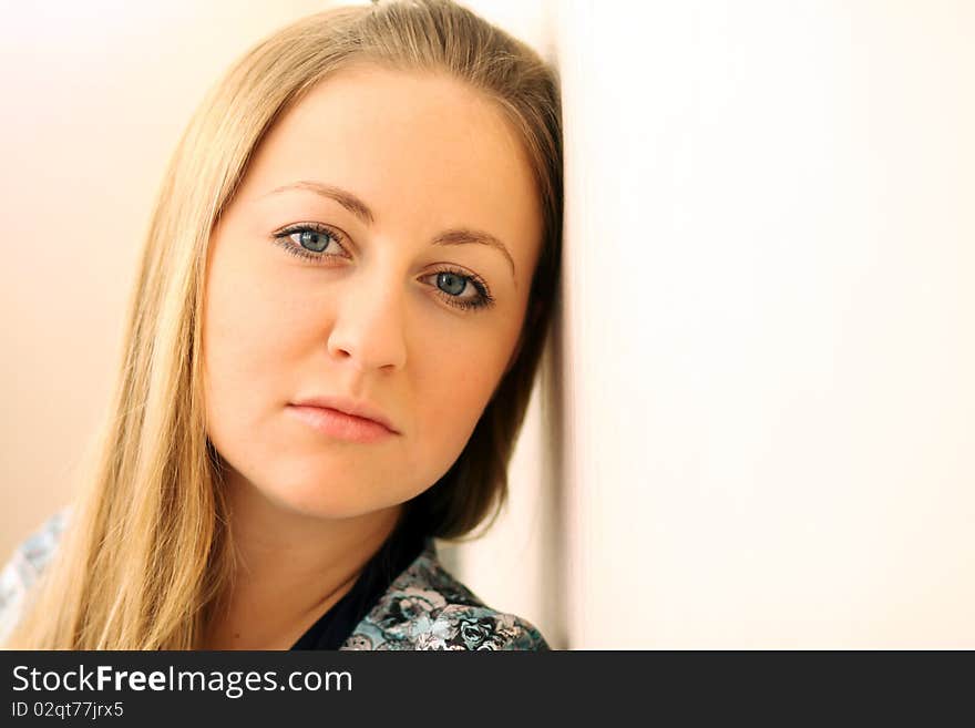 Portrait of beautiful woman in home