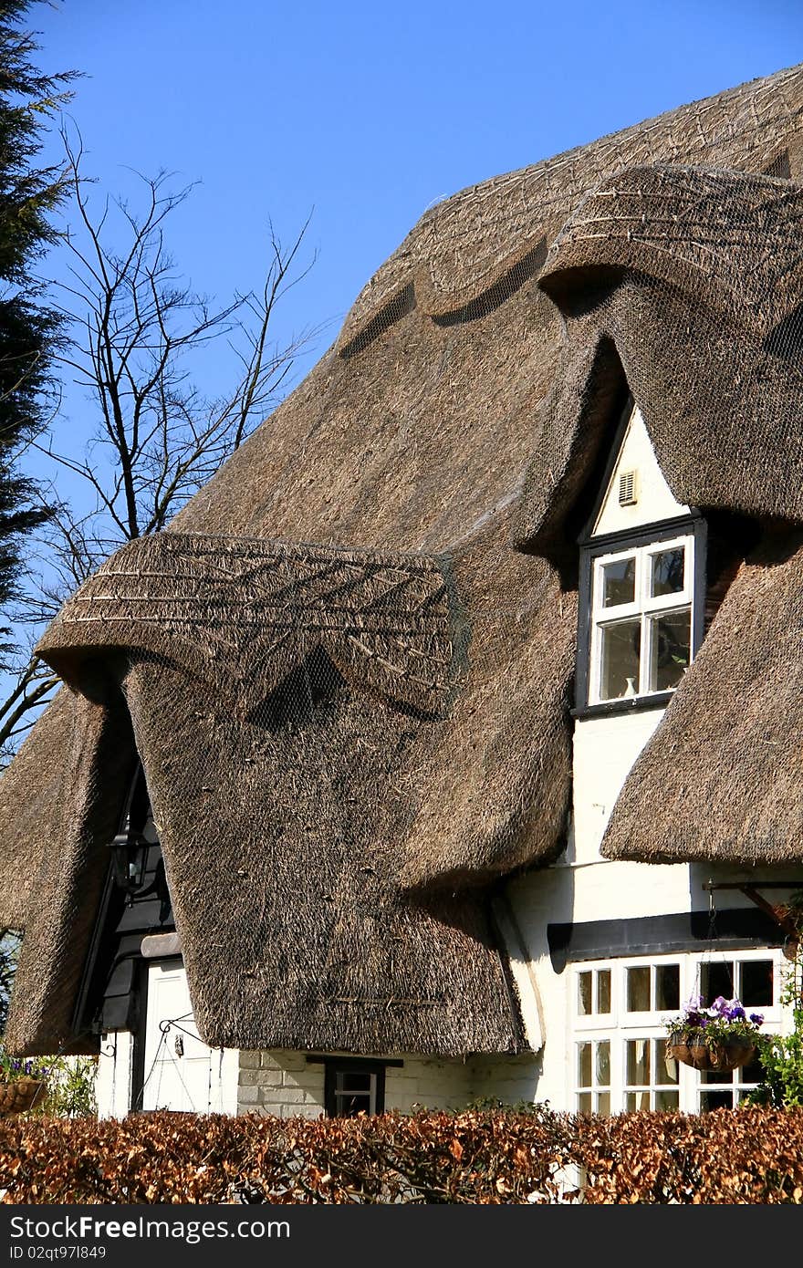 Image of a thatched roof home in the uk. Image of a thatched roof home in the uk