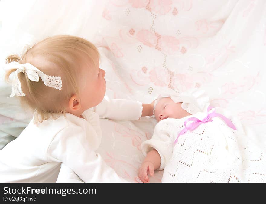 The image of the girl and its newborn sister. The image of the girl and its newborn sister