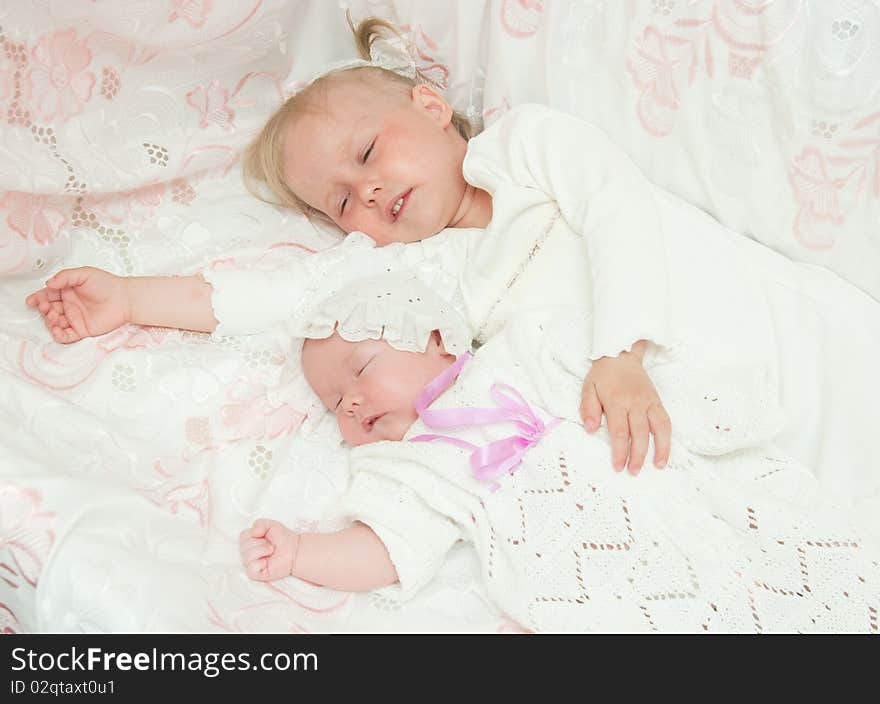 The image of the girl and its newborn sister. The image of the girl and its newborn sister