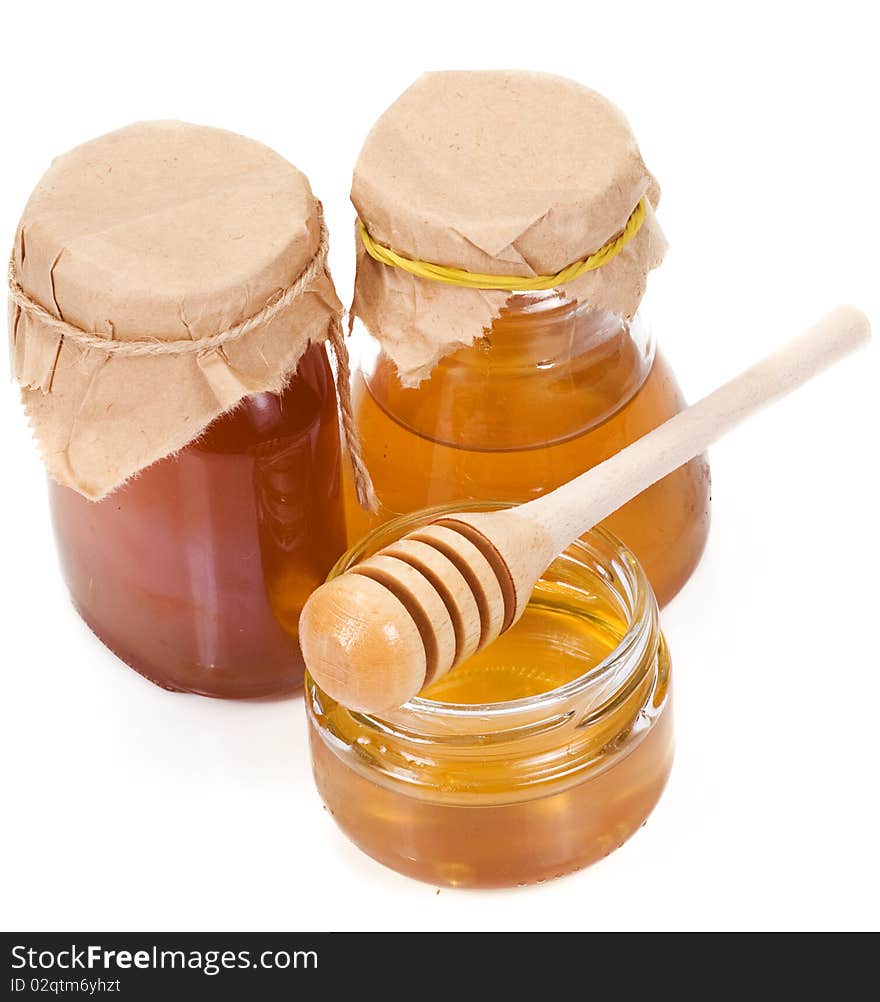 Three isolated glass of honey