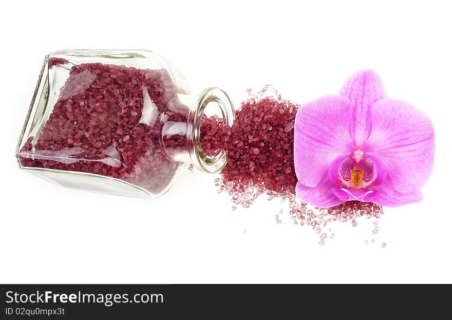 bath salt and orchid isolated on white