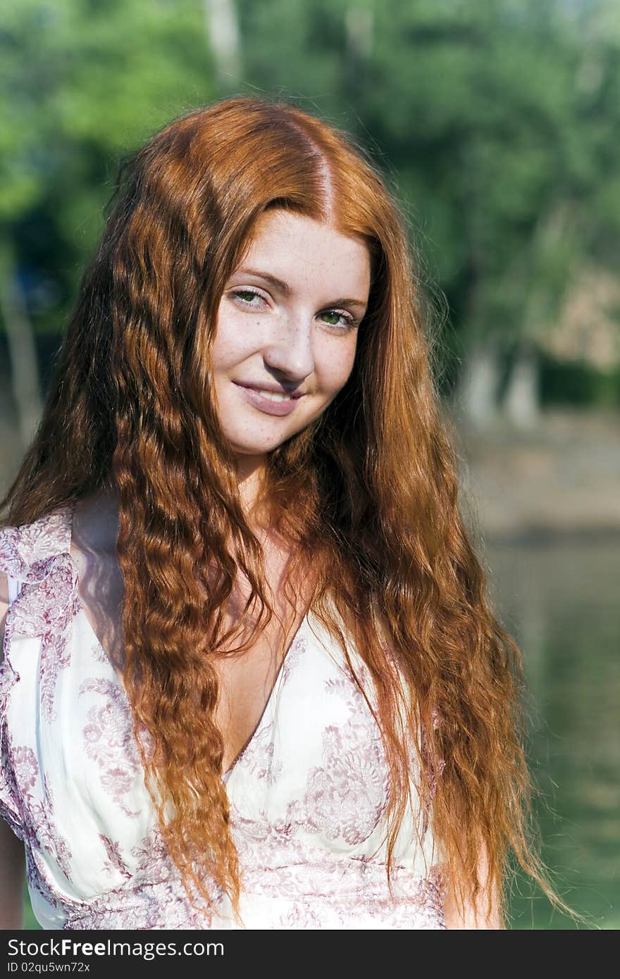 Portrait of an attractive red-haired girl