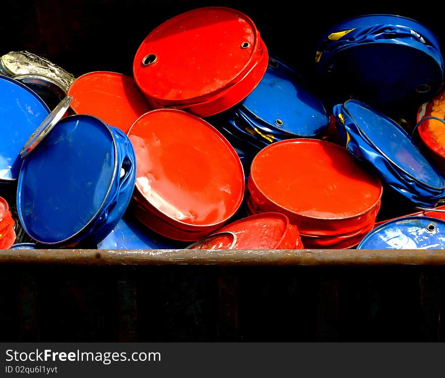 Red and blue barrels loaded in a container. Red and blue barrels loaded in a container