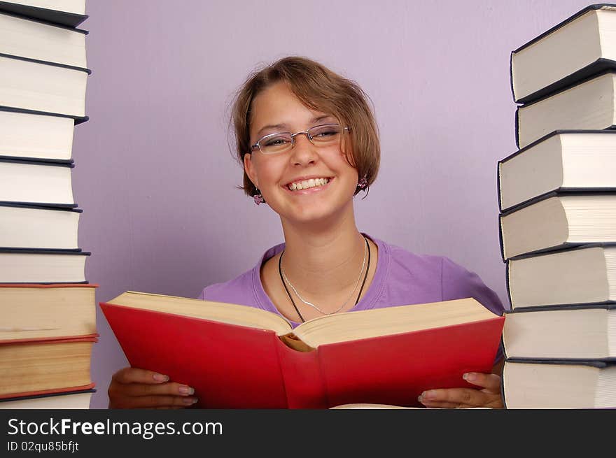 Girl in purple with red book. Girl in purple with red book