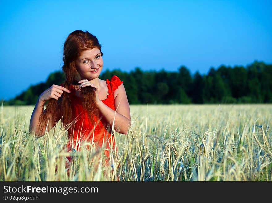 Portrait of an attractive red-haired girl