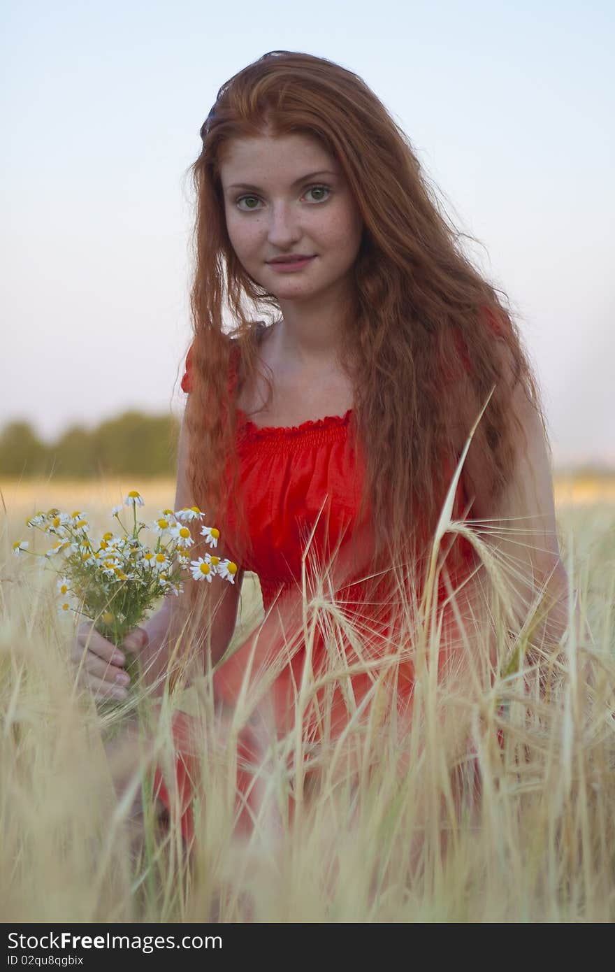 Portrait of an attractive red-haired girl