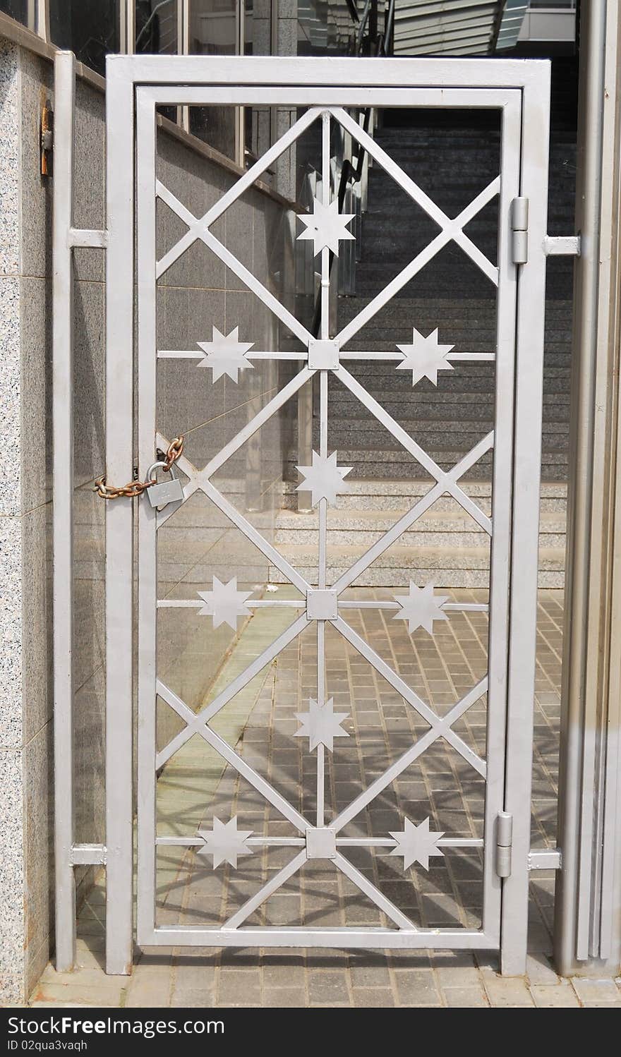 Metal door with stars and the lock. Metal door with stars and the lock