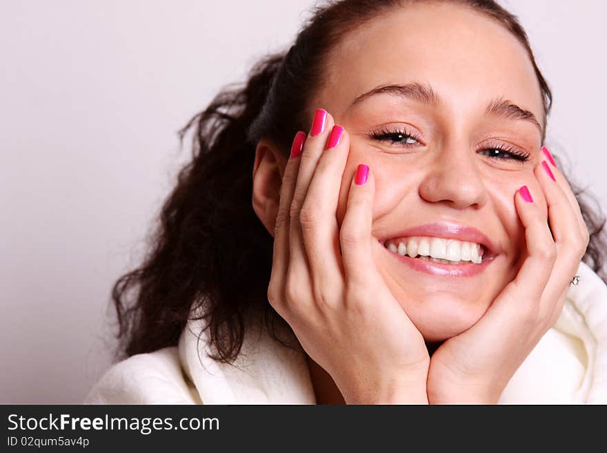 Young woman on grey background. Young woman on grey background