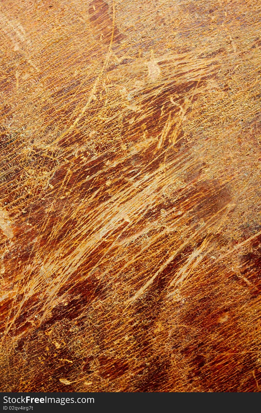 Scratched veneer surface. Abstract grunge wood background.