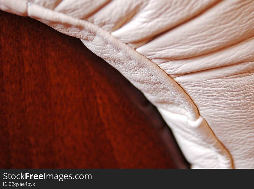 Wood and leather sofa closeup. Wood and leather sofa closeup