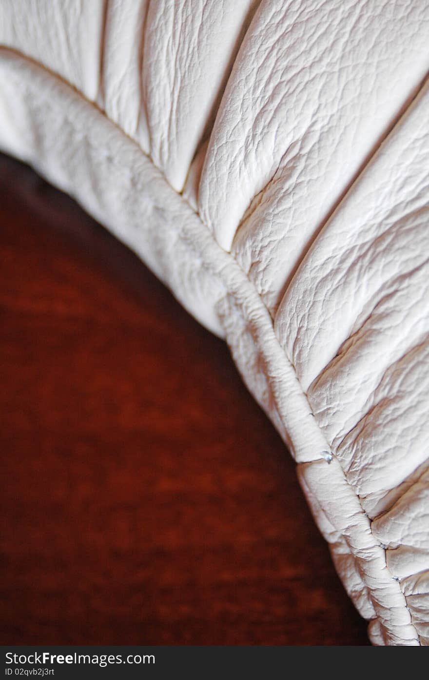 Wood and leather sofa closeup. Wood and leather sofa closeup