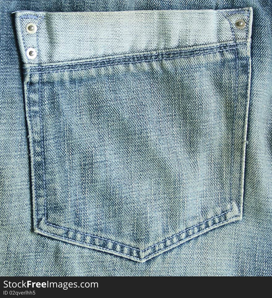 Closeup of blue jeans pocket