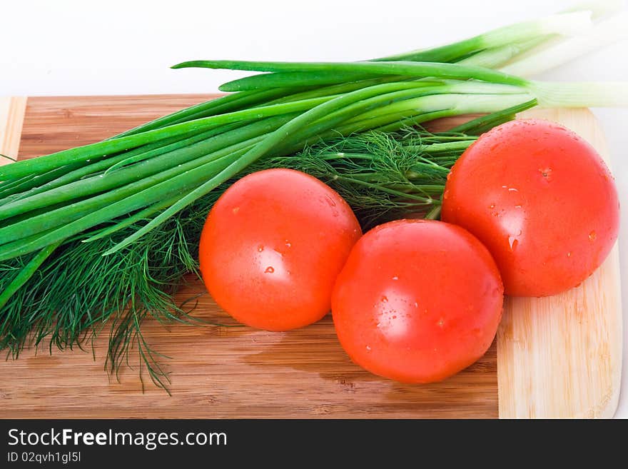 Fresh vegetables on wood plate