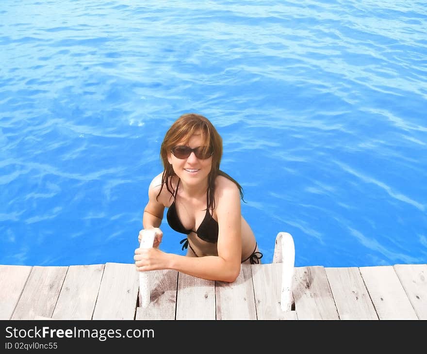 Young girl in the swimming pool