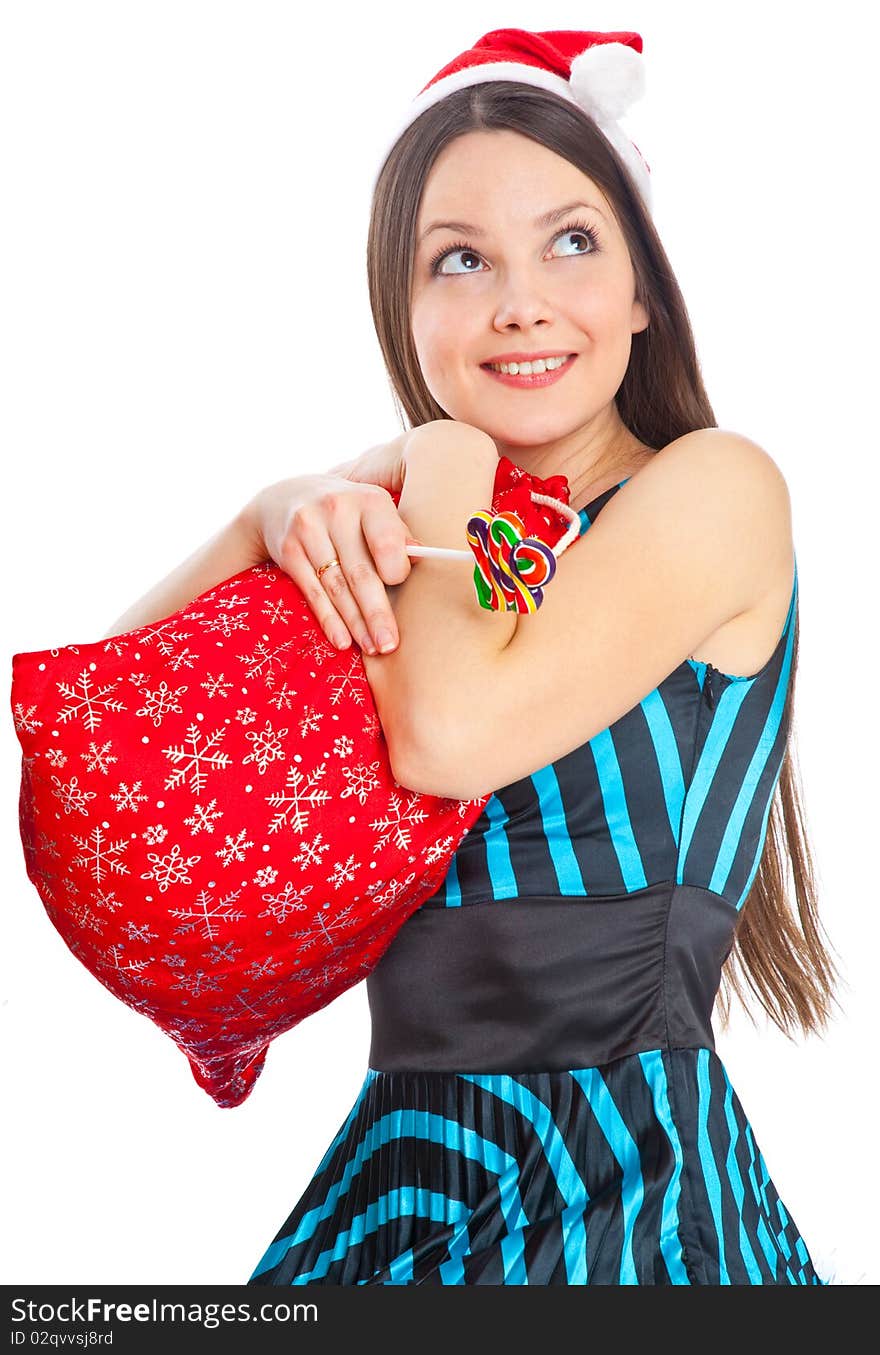 Girl near Christmas fir tree. Isolated on white