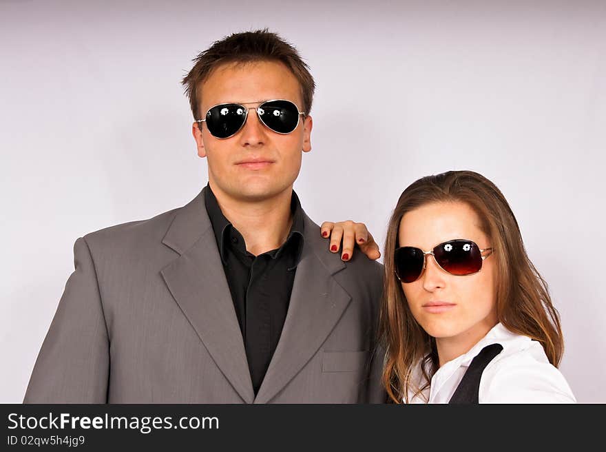 Closeup of a handsome young businessman and young businesswoman. Closeup of a handsome young businessman and young businesswoman