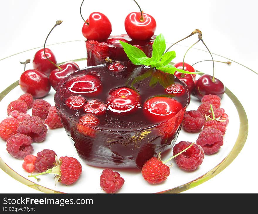 Cherry jelly dessert with berries