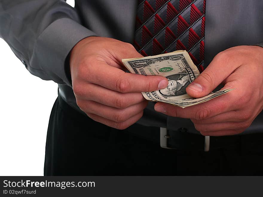 The businessman in a grey shirt and a tie has control over money. The businessman in a grey shirt and a tie has control over money.