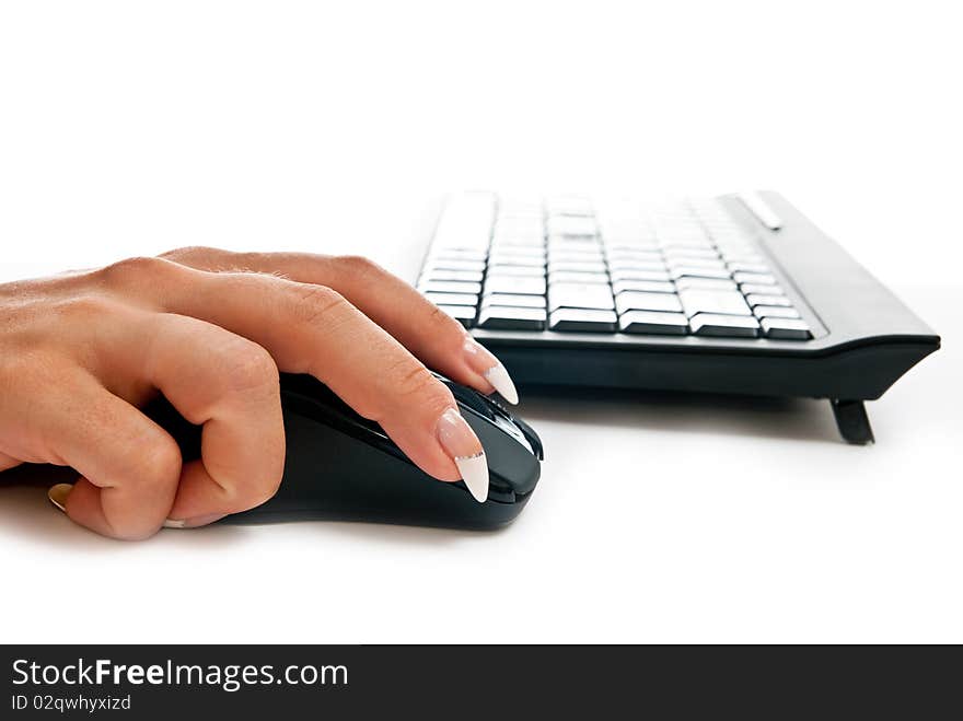 Female hand on computer mouse. Horizontal shot. Female hand on computer mouse. Horizontal shot