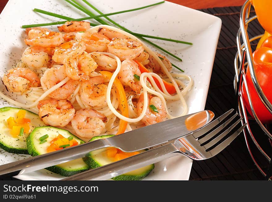 Fresh prepared shrimp with vegetables and pasta. Fresh prepared shrimp with vegetables and pasta.