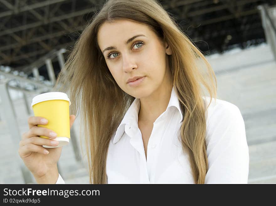 Young successful businesswoman having a coffebreak. Young successful businesswoman having a coffebreak