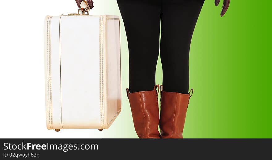 Woman carrying classic travel bag. Woman carrying classic travel bag.