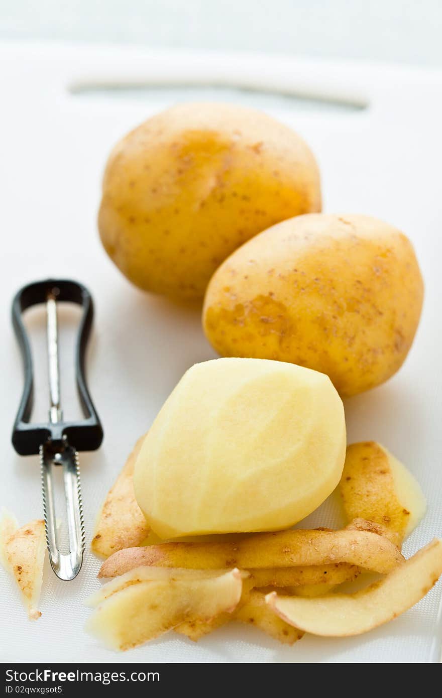 Potatoes And A Peeler